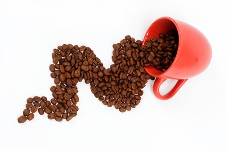 Flow beans from an overturned cup on a white background.の写真素材