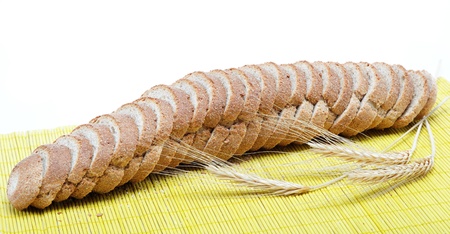 Fresh bread on a light brown background.