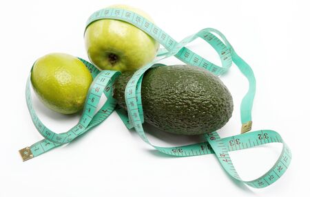 Natural products. Diet. Fresh fruit on a white background.の写真素材