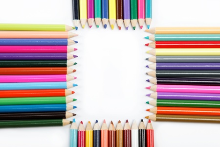 Close up of color pencils with different color over white background.の写真素材