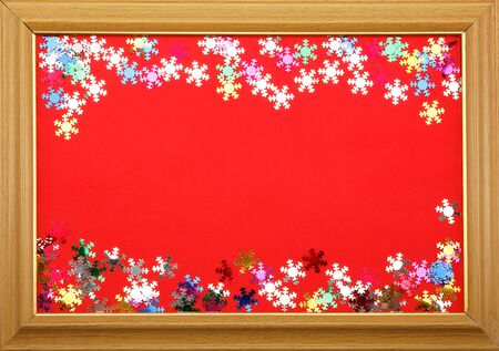 Wooden frame with red background.の写真素材