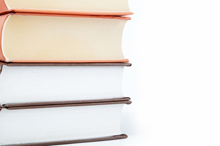 A stack of books on a white background.