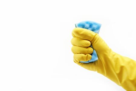 Hand with rubber glove and cleaning sponge on white backgroundの写真素材