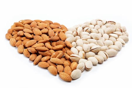 The image of the heart of the almond and pistachio nuts.の写真素材