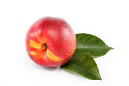 Fresh nectarin isolated on a white background.の写真素材