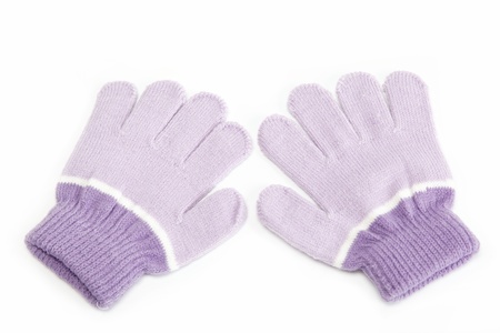 Purple woolen gloves, isolated on white background  Cold winter clothing の写真素材