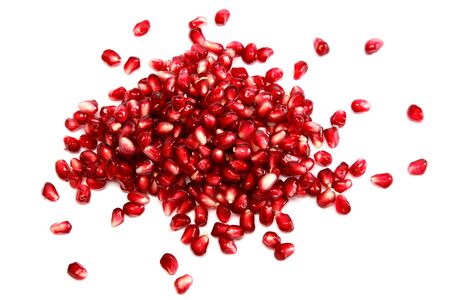 Pomegranate seeds on a white background.の写真素材