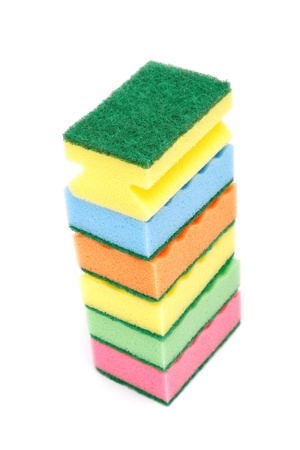 Stack of cleaning sponges on a white background.の写真素材