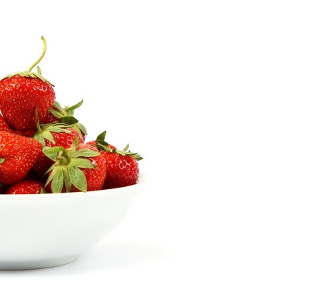 Fresh strawberry fruit in a white dish の写真素材