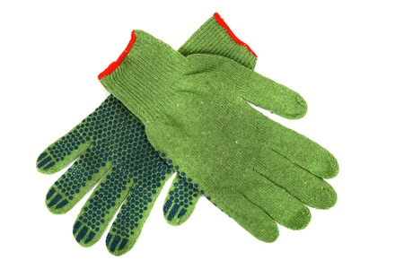 Green work gloves isolated on white background の写真素材