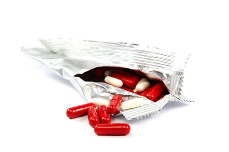 Medications. Pill capsules isolated on white background.の写真素材