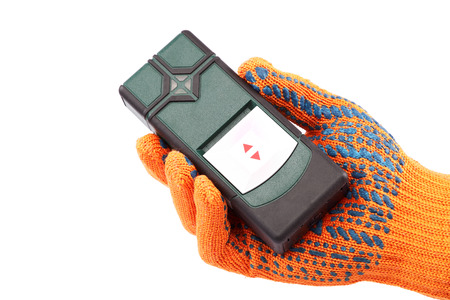 Modern laser measuring level in hand with glove isolated on white background.