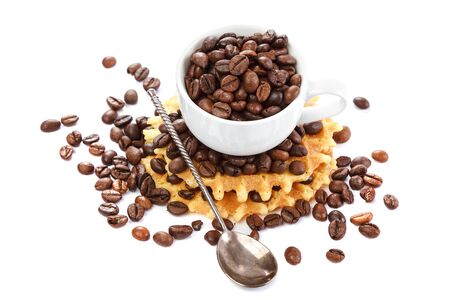 Waffle cookies and coffee grains isolated on a white background.の写真素材