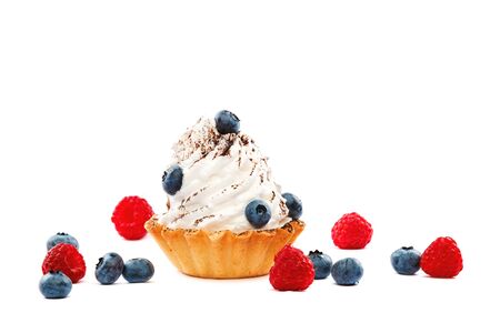 Cake with fresh blueberries and raspberries isolated on a white background.の写真素材