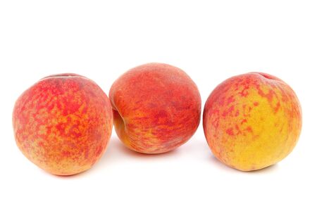 Fresh peach fruit isolated on a white background.の写真素材