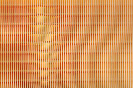 Air filter surface as background.