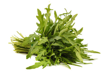 Fresh bunch of arugula isolated on a white background.の写真素材