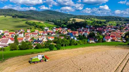 Late summer grain harvest near Schmalkalden - Thuringia - Germanyのeditorial素材