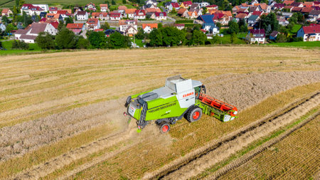 Late summer grain harvest near Schmalkalden - Thuringia - Germanyのeditorial素材