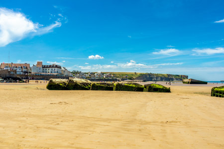 Beach walk on the beautiful Gold Beach off the coast of Ver-sur-Mer - Normandy - Franceのeditorial素材