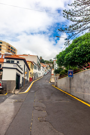 On the road in the romantic port city of Funchal on the Azores island of Madeiraの写真素材