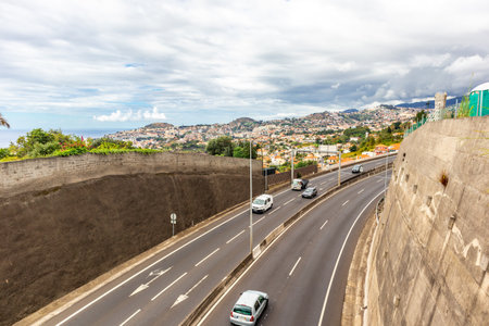 On the road in the romantic port city of Funchal on the Azores island of Madeiraの写真素材