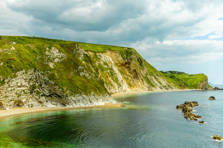 Travelling on the South West Coast Path between Lulworth Cove and Durdle Door near Lulworth - United Kingdomの写真素材