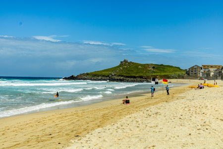 A relaxing day on the beach in front of St Ives Bay in beautiful Cornwall - United Kingdomの写真素材