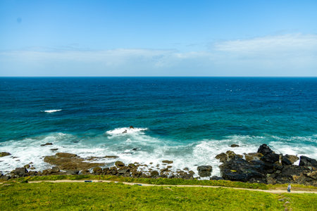A relaxing day on the beach in front of St Ives Bay in beautiful Cornwall - United Kingdomの写真素材
