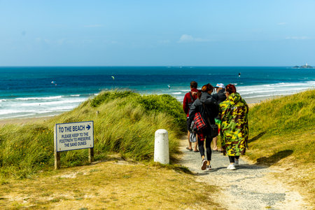 A relaxing day on the beach in front of St Ives Bay in beautiful Cornwall - United Kingdomの写真素材