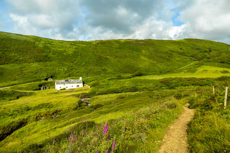 A beautiful walk to Hartland Point with its beautiful lighthouse and stunning sea views - Devon - United Kingdomの写真素材