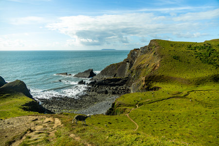 A beautiful walk to Hartland Point with its beautiful lighthouse and stunning sea views - Devon - United Kingdomの写真素材