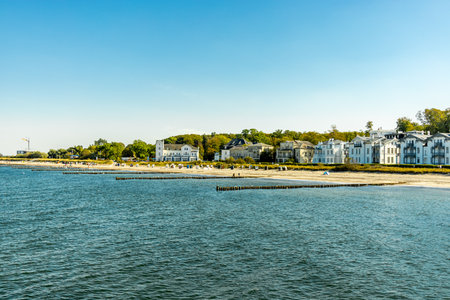 A walk on the beach at the Baltic seaside resort of Heiligendamm in beautiful sunshine - Mecklenburg-Western Pomerania - Germanyの写真素材