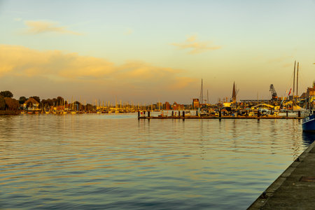 City walk through the Hanseatic city of Rostock on the Baltic Sea on an autumnal day -...