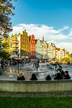 City walk through the Hanseatic city of Rostock on the Baltic Sea on an autumnal day -...