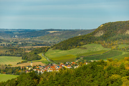 A colorful autumnal hike through the beautiful landscape of the Saale near Jena - Thuringia -...