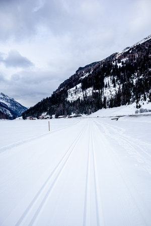 A round of cross-country skiing at the Rein in Taufers cross-country skiing center in the beautiful Reintal valley - South Tyrol - Italyの写真素材