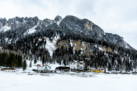 Hike around the snow-covered Lago di Misurina at the gates of the Three Peaks Nature Park - Italyの写真素材