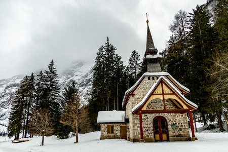 A short hike to the snow-covered Lake Braies in the Braies Dolomites - South Tyrol - Italy
