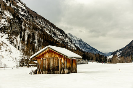 A short winter hike at the Rein in Taufers cross-country skiing center in the beautiful Reintal valley - South Tyrol - Italyの写真素材