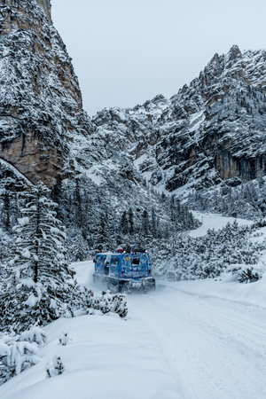A walk through the deep snow in the South Tyrolean region at the PederÃ¼ mountain inn - South Tyrol - Italyの写真素材