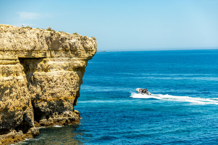 A short visit to the beach in Marinha Bay off the beautiful coast of the Algarve - Portugalの写真素材