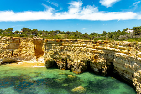 A short visit to the beach in Marinha Bay off the beautiful coast of the Algarve - Portugalの写真素材