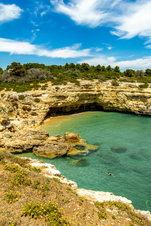 A short visit to the beach in Marinha Bay off the beautiful coast of the Algarve - Portugalの写真素材
