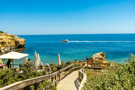 A short visit to the beach in Marinha Bay off the beautiful coast of the Algarve - Portugalの写真素材