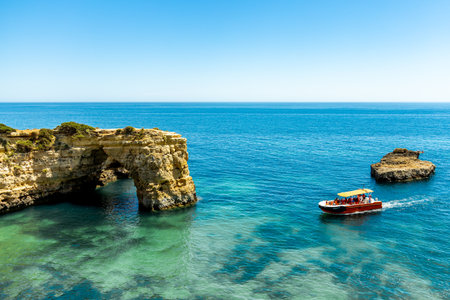 A short visit to the beach in Marinha Bay off the beautiful coast of the Algarve - Portugalの写真素材