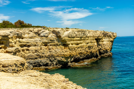A short visit to the beach in Marinha Bay off the beautiful coast of the Algarve - Portugalの写真素材