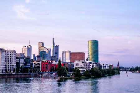 Evening stroll through the Main metropolis of Frankfurt am Main and its beautiful harbor promenade - Hesse - Germanyの写真素材