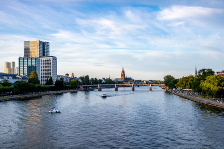 Evening stroll through the Main metropolis of Frankfurt am Main and its beautiful harbor promenade - Hesse - Germanyの写真素材