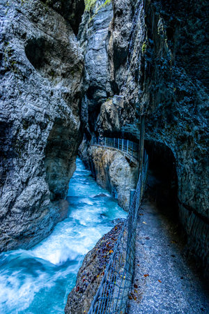 Mountain hike through the beautiful Bavarian Alps just outside Garmisch-Partenkirchen up to the Zugspitze - Bavaria - Germanyの写真素材
